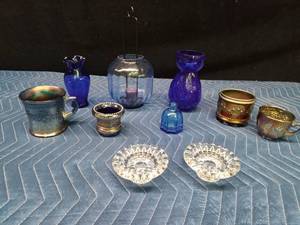Blue glassware and 2 candlestick holders