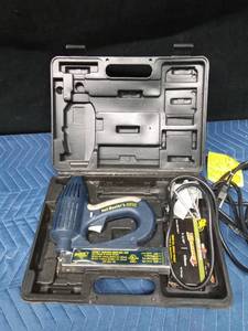 Electric brad nail gun in case with nails - WORKS