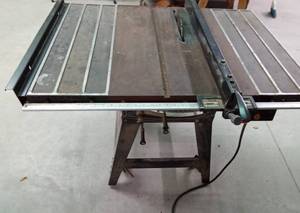 Craftsman metal table saw on wheels