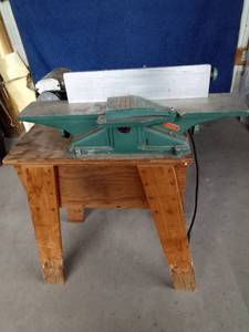 Shop Master planer mounted on stand with wheels