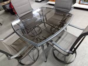 Glass top Patio Table with 4 swivel chairs
