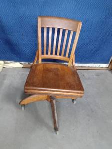 Vintage solid wood adjustable office chair on wheels