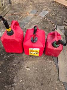 3 Red Gas Cans, 2 2 Gallon and 1 1 gallon