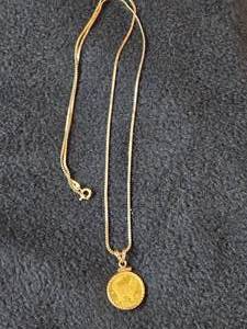 8.7-grams (total) 14K Gold Chain with 1991 Isle of Man Proof Gold Norwegian Cat Elizabeth II Coin Pendant 24