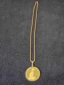 20.5-grams (total) Chain with Proof 0.5-oz Gold Cat Coin Pendant (Egypt 1989)