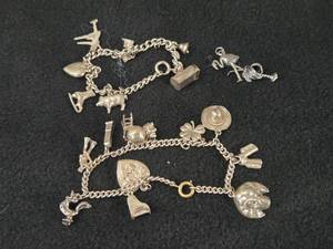 59-grams (total) Sterling Silver - Lot of (2) Charm Bracelets