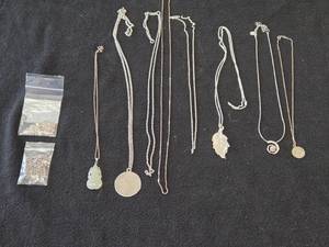 Lot of (9) Necklaces  Silver-toned