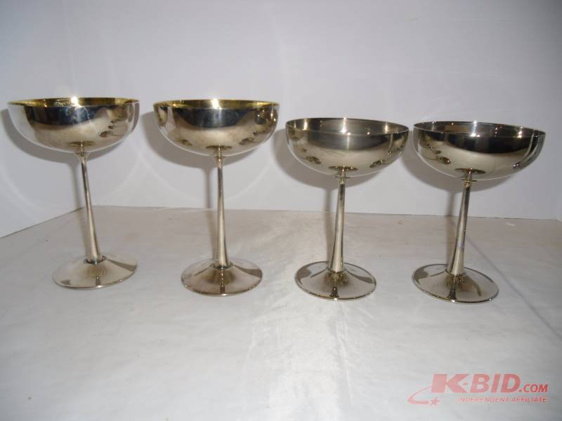 lot 12 image: Mid-Century Entertaining - Cocktail Shaker, Silver-plate Goblets,  Teak Meat Platter, Dansk S&P