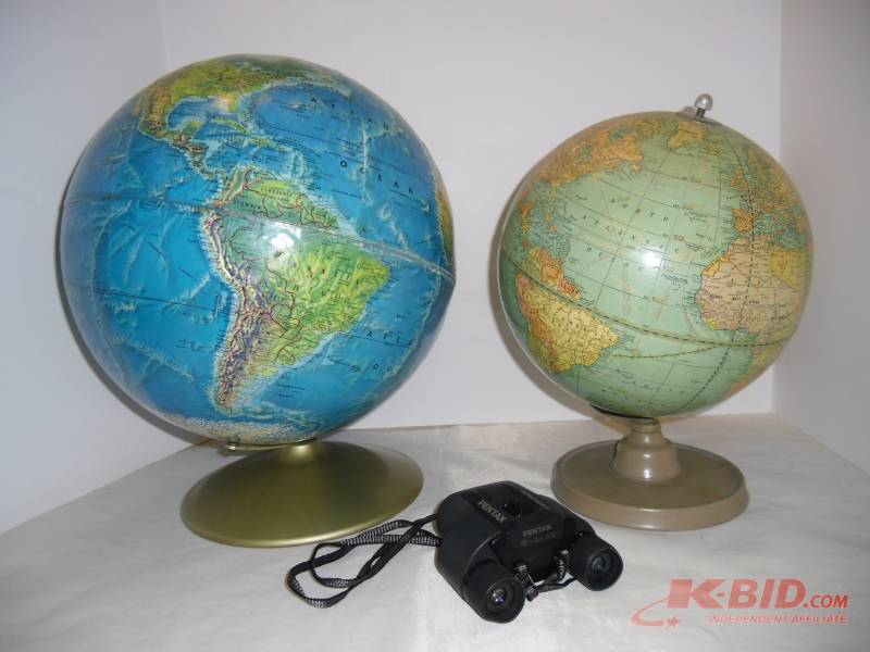 lot 18 image: See the World  Two vintage Globes and Pentax Binoculars