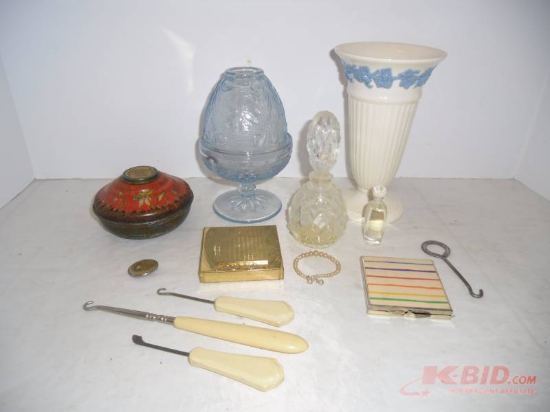lot 27 image: Ladies Collectible  Compacts, Perfume Bottle, Wedgwood Vase, Button Hook, Face Powder Tin