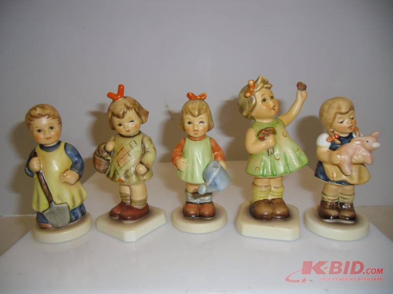 lot 37 image: Wade England Figurines and Goebel Hummel Collectors Club Girl and Boy Figures