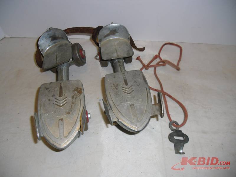 lot 38 image: 1950s Old Roller Skates, Tin Spinning Top, Marbles, Dominoes in Case, Magic Snake