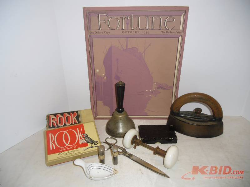 lot 44 image: Antique Collection Circa 1930s Fortune Magazine, Sad Iron, Rook Games, 1873 Med Spoon 