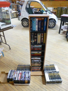 Collection of DVDs and VHS Tapes with Tower Cabinet