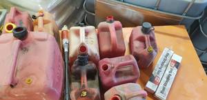 Gas cans and 2 Steel strapping tool