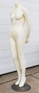 Adult Female Full-Body Headless Mannequin With Metal Base, For Displaying Clothing In Retail Environments.�