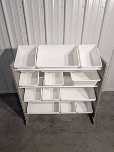 Storage Rack with Plastic Bins on Metal Shelving Unit