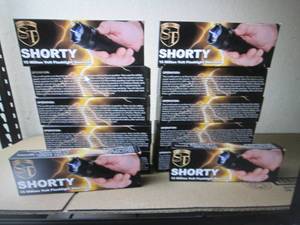 New stun gun  flashlight and 12 15...