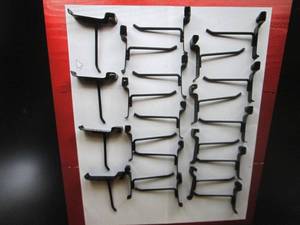 4 Peg hooks for wire grid panels...