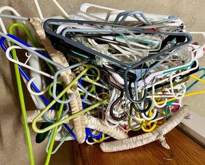 Plastic Clothes Hangers and Basket