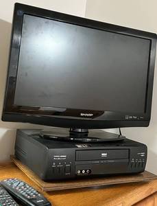 Sharp Flat-Screen TV & RCA DVD Player & 2 Remotes 24