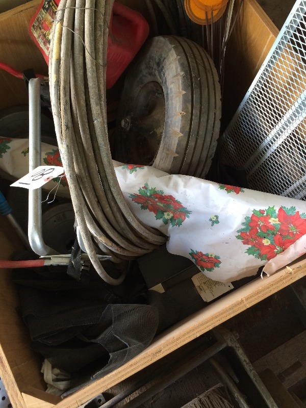 lot 108 image: Large Lot of Assorted items including, 100 ft paint sprayer hose, trailer tire, electronics, bike rack, door screen  some
