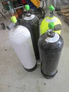 SCUBA Tanks - Four Cylinders with Green Valve Caps