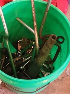 Green Bucket with Assorted Hand Tools - Wrenches, Pliers, Hex Keys