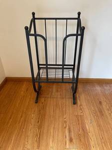 Black Metal Magazine Rack with Rocking Base and Wire Shelf