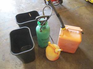 Fuel cans, yard sprayer and trash receptacles