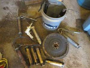 Grease guns, grease cans and auto parts