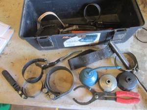 Toolbox filled with oil filter wrenches