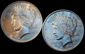 (2) Common Date Peace Dollars