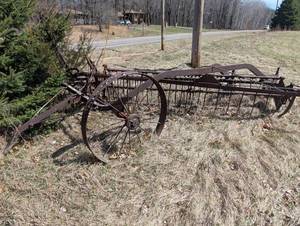 Hay Rake - Vintage Wheel-Driven Frame, Rusted Iron Farm Implement