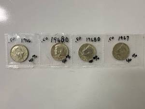 Four Kennedy Half-Dollar Coins