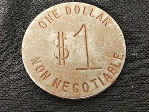 Non-Negotiable One Dollar Metal Token