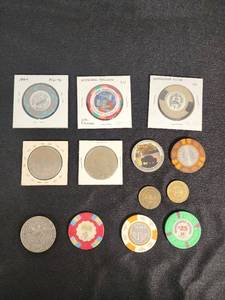 Collection of Casino Chips and Tokens including Binions Horseshoe, Imperial Palace, and Golden Nugget