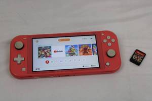 Nintendo Switch Console Lite - PinkCoral with Mario Kart 8 Deluxe Cartridge Parental Controls ON