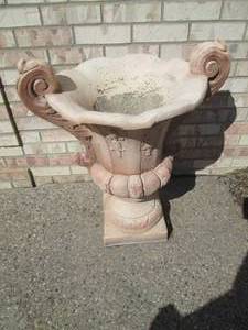 Cement planter measures 28 tall...