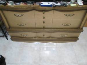 Dresser with mirror, top is 17 x 56...