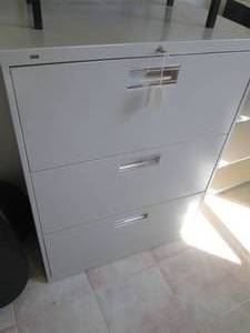 Legal size locking vertical file...