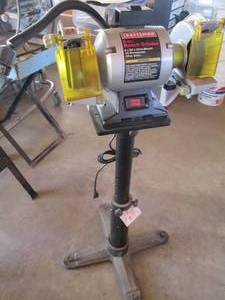 Craftsman 6in bench grinder on a st...