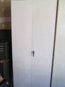 Metal cabinet 7 tall, 3 wide...