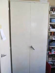 Metal cabinet 7 tall, 3 wide...
