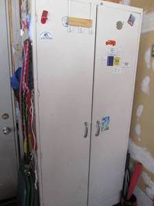 Metal cabinet 7 tall, 3 wide...