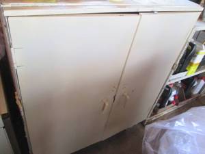 Cupboard style garage organizer cab...