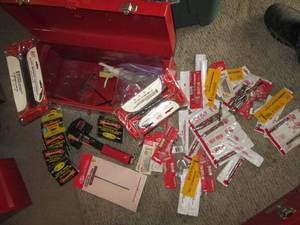Toolbox filled with mainly new dril...