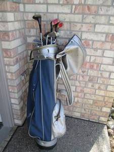Golf clubs and balls in a golf bag...