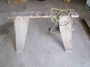 Wooden saw horse with bungee net...