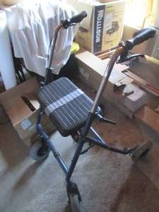 Walker with brakes and seat, colaps...